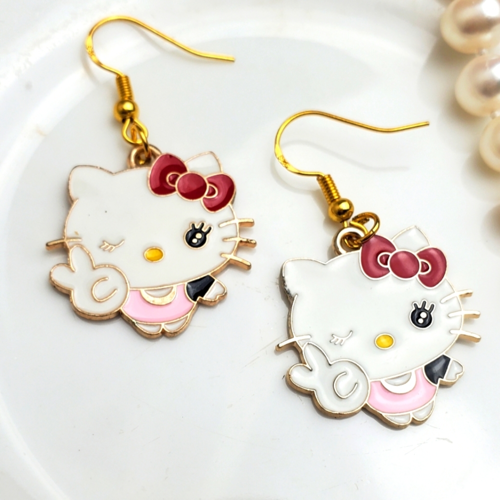 🌟5/$25 Hello Kitty peace sign earrings